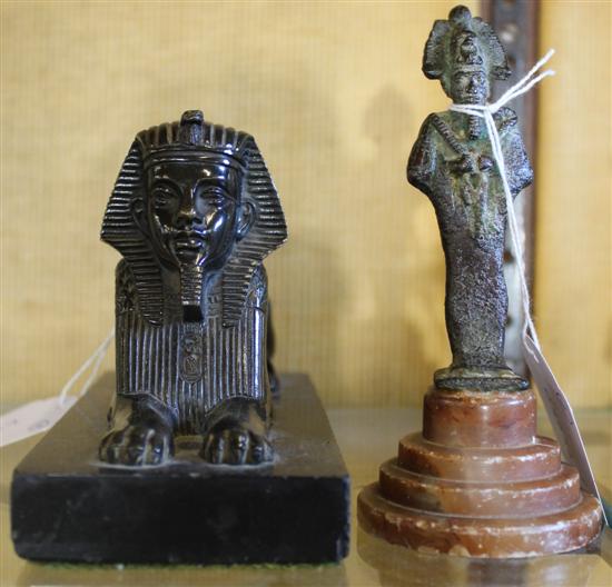 Bronze sphinx & a ushabti on stand